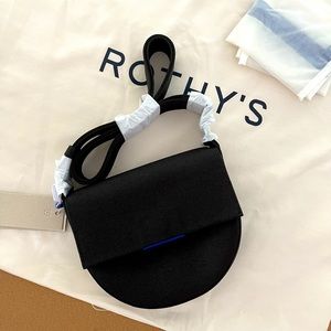 Rothy’s black saddle bag